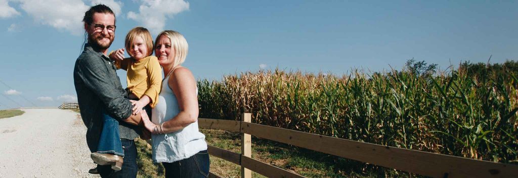 A family on a rural road.